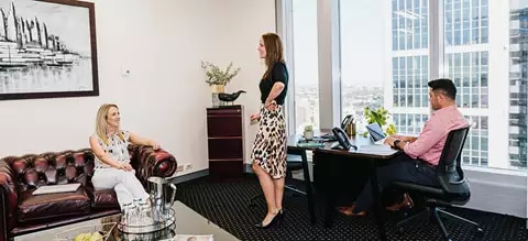 Serviced Office with a view at Qubic Square, featuring people working in a modern space with a luxury fit-out.